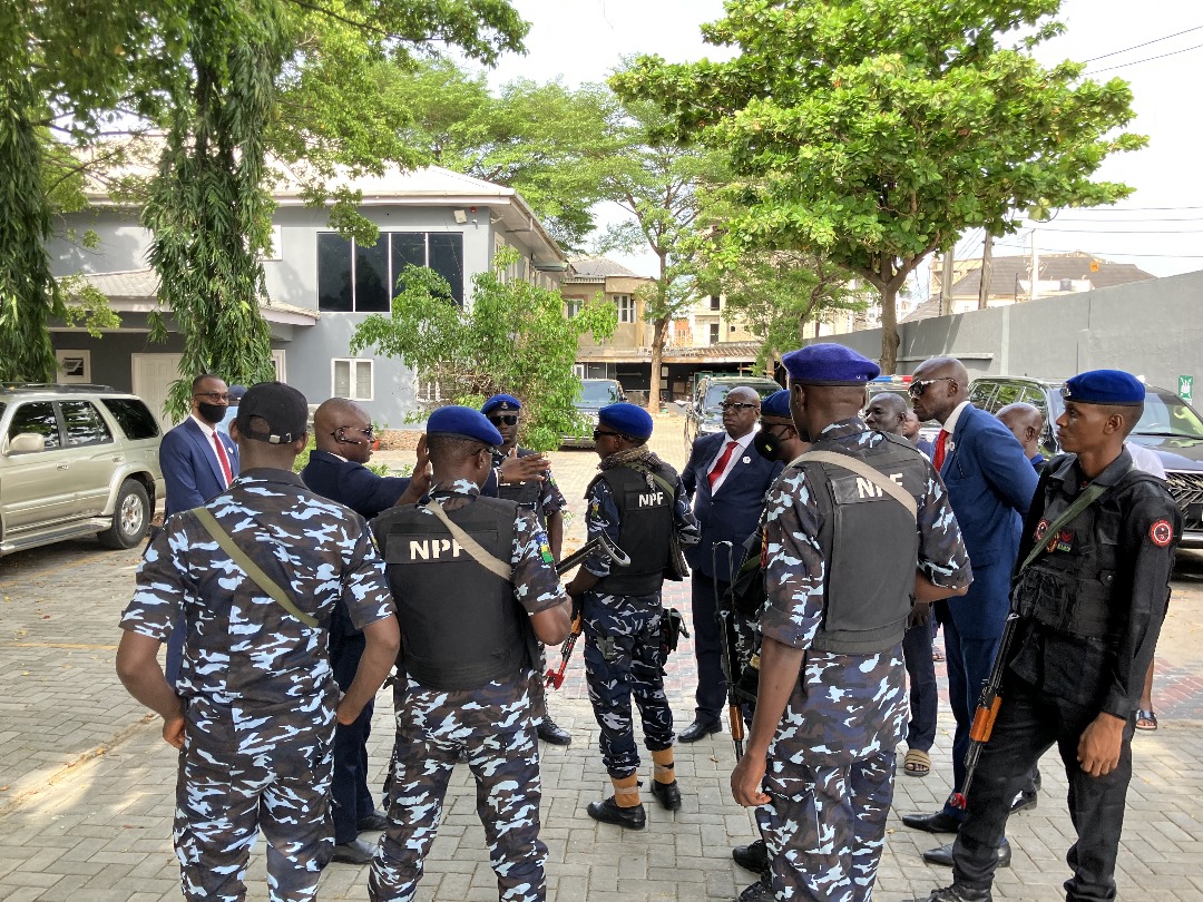 Protego mobile patrol and rapid response team conducting operational debrief with Nigerian Police Force