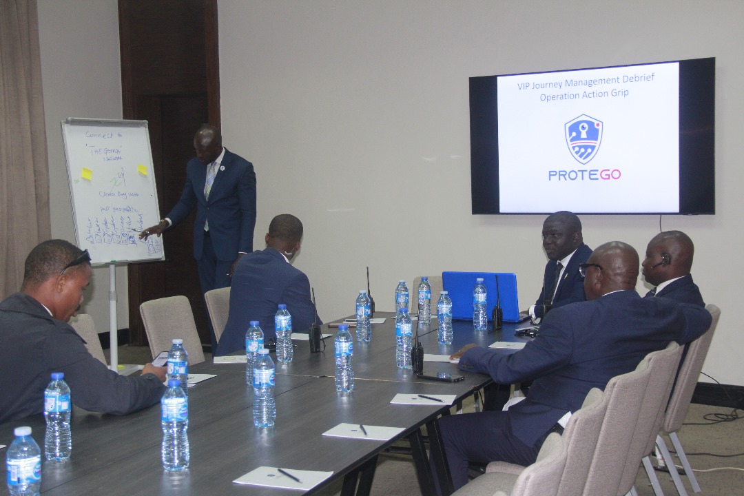 Protego security training session in boardroom with VIP Journey Management debrief presentation